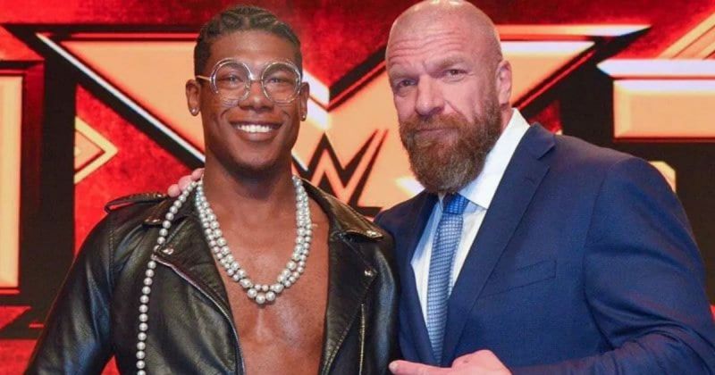 Velveteen Dream and Triple H.