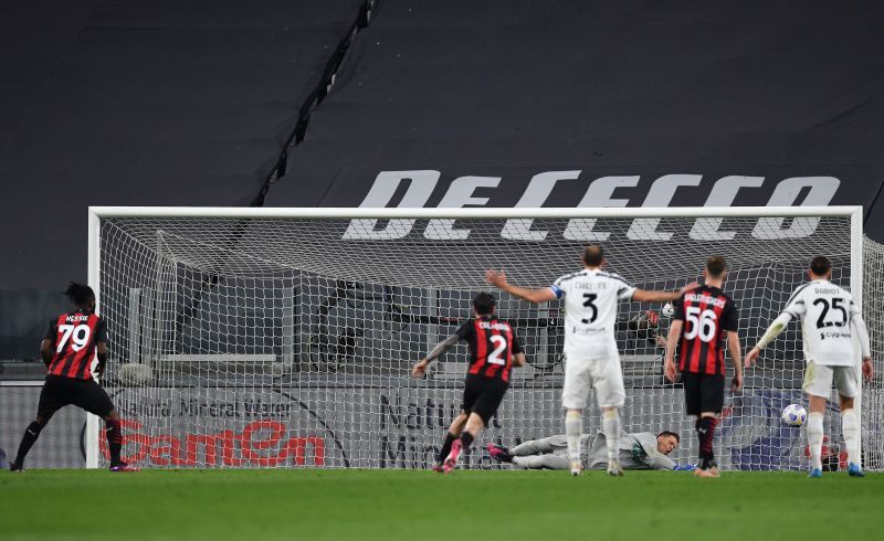 A match official awarded AC Milan a penalty after a lengthy consultation with VAR