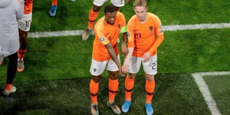 Georginio Wijnaldum (left) and Frenkie de Jong (right) sent a strong anti-racism message during their goal celebration.