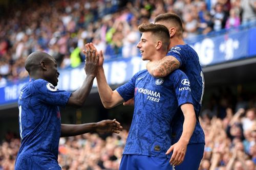 N'Golo Kante and Mason Mount celebrate a goal.