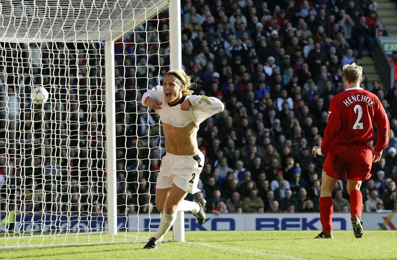 Diego Forlan of Manchester United celebrates scoring the first goal of the FA Cup match against Liverpool