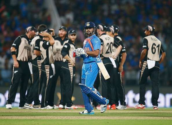 New Zealand celebrate the dismissal of Suresh Raina.