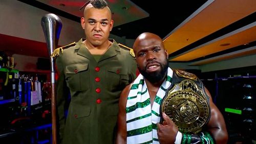 Apollo Crews and his muscle, Commander Azeez