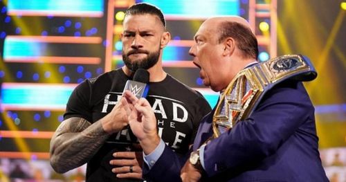 Roman Reigns and Paul Heyman.