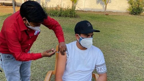 Kuldeep Yadav's controversial photo of getting COVID-19 vaccine at a guesthouse