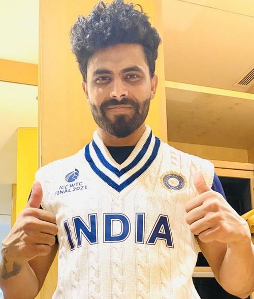 Ravindra Jadeja unveils the Team India sweater for the WTC final. Pic: Ravindra Jadeja/ Twitter