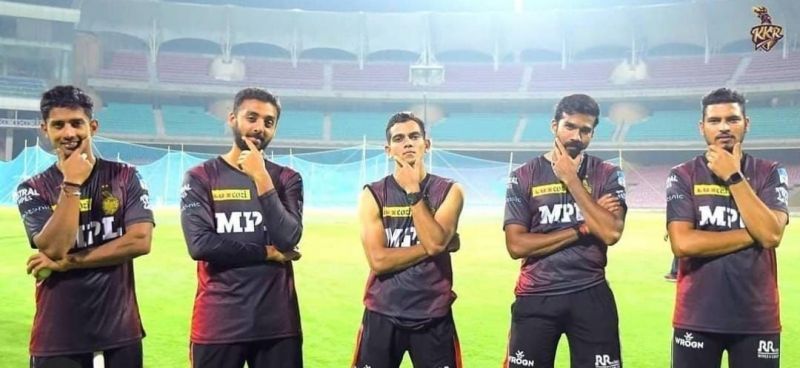 Varun Chakravarthy (second from left) and Sandeep Warrier (second from right) were the first to contract COVID-19 mid-season [Credits: KKR]