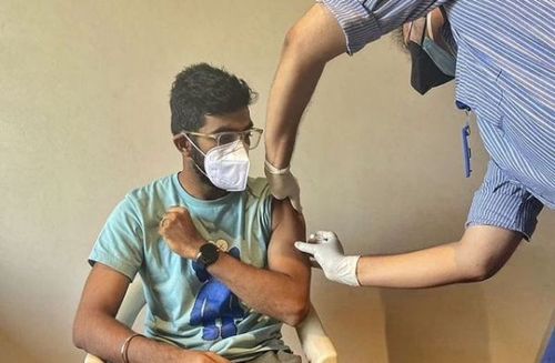 Jasprit Bumrah receives the first dose of the COVID-19 vaccine. Pic: Jasprit Bumrah/ Twitter