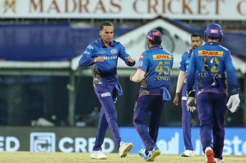 Rahul Chahar celebrating a wicket alongside Rohit Sharma. (Credits: news18.com)