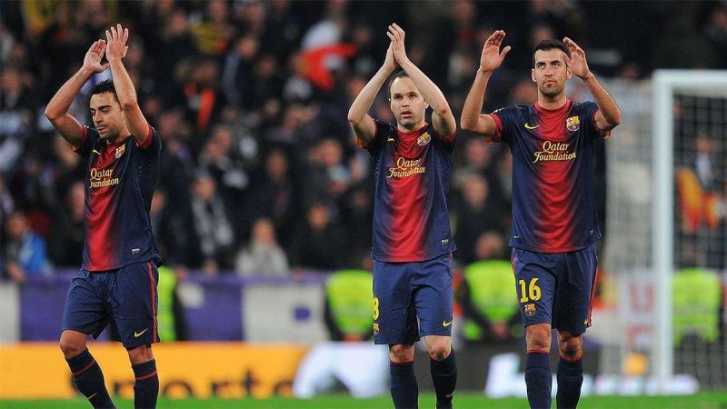 Xavi, Andres Iniesta and Sergio Busquets