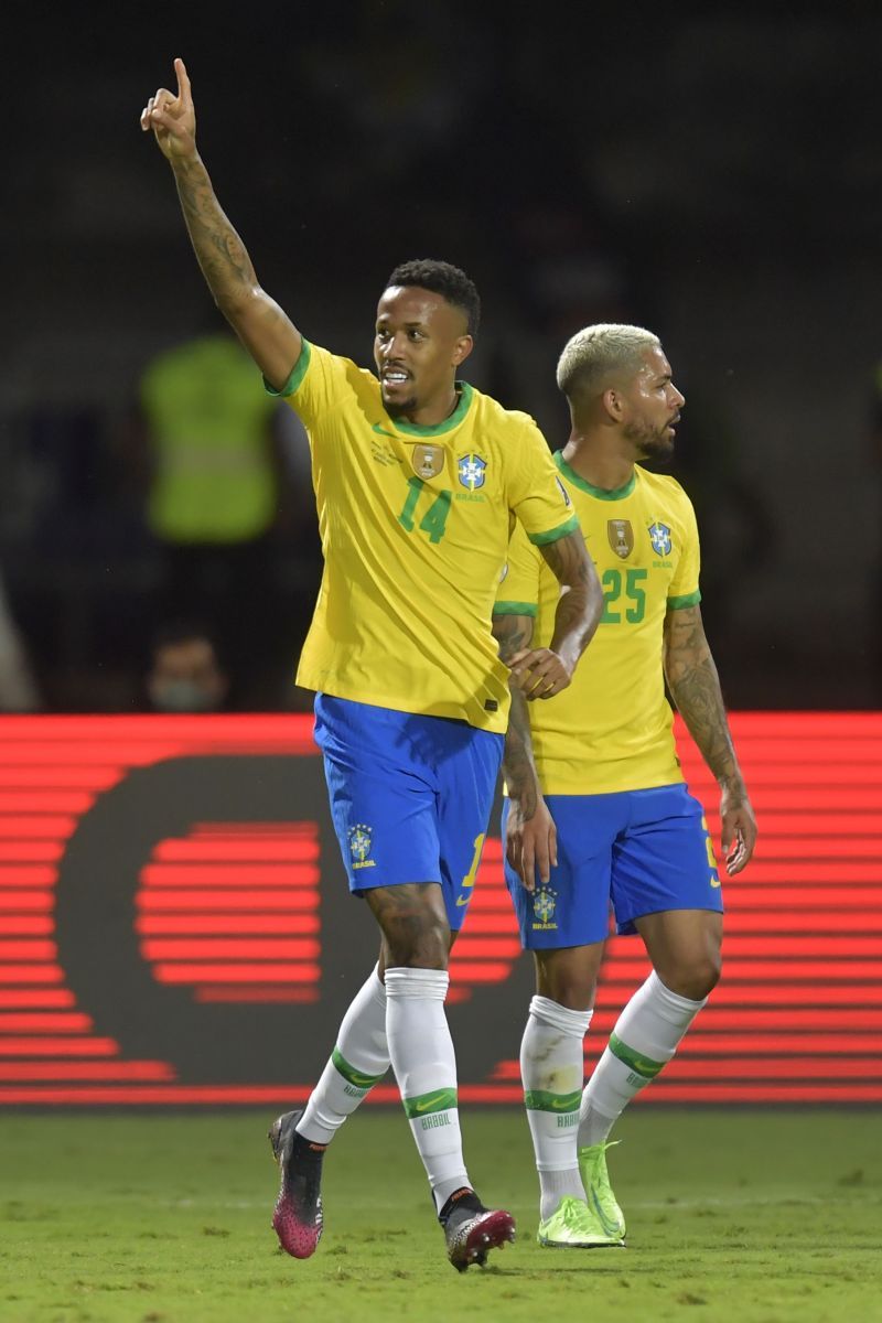 Eder Militao (left) celebrates after scoring for Brazil against Ecuador
