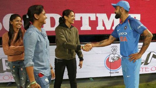 Virat Kohli with Indian women's cricket team stars