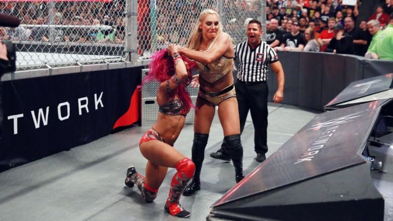 In 2016, Charlotte Flair defeated Sasha Banks in WWE's first women's Hell in a Cell match