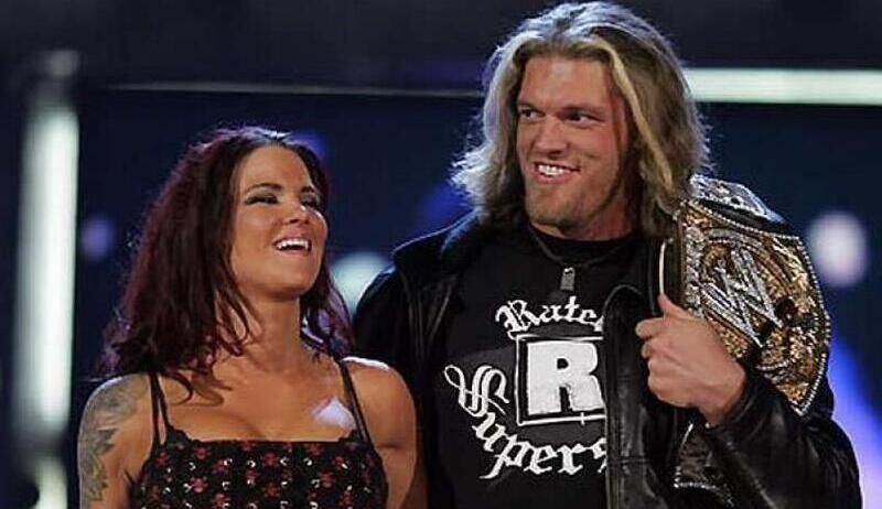 Lita with Edge as WWE Champion