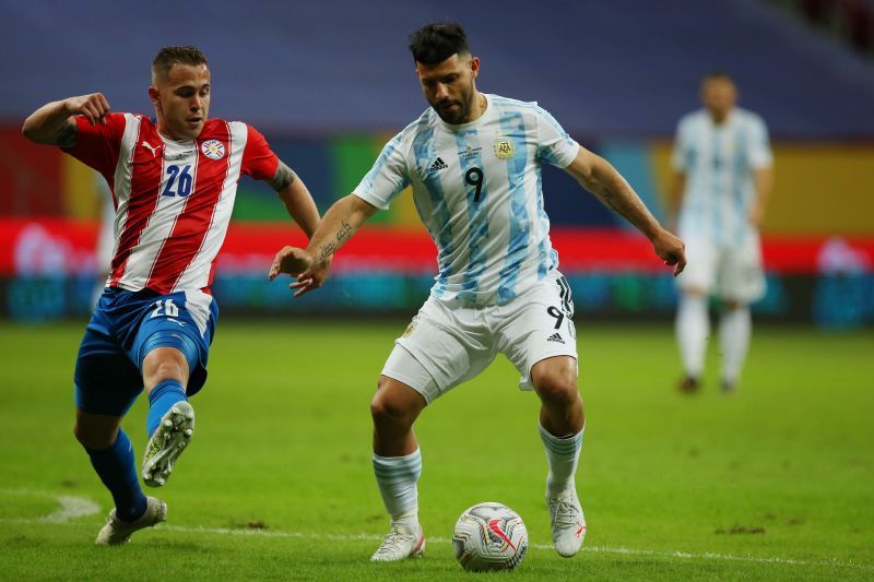 Sergio Aguero (right) in action for Argentina against Paraguay