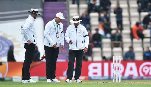 Umpires using their light meter in Southampton on Saturday