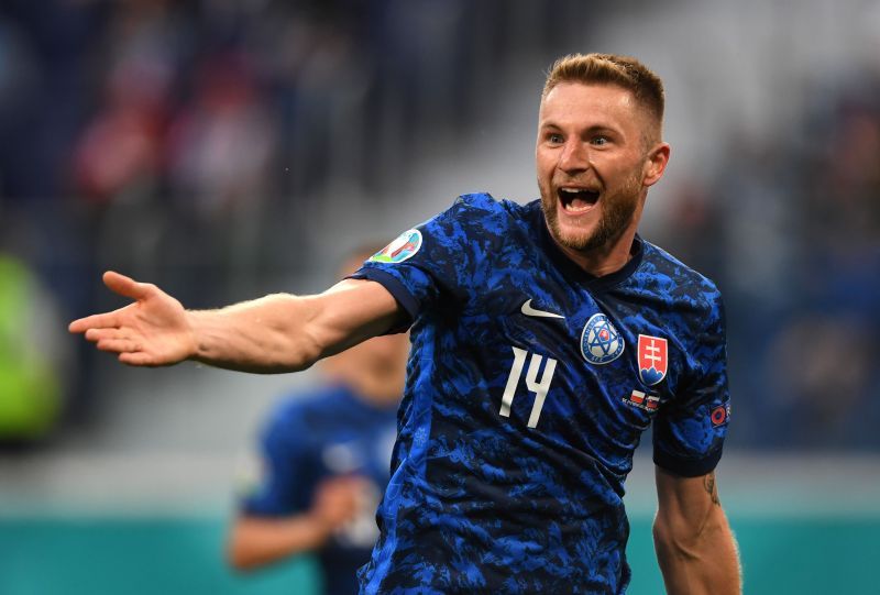 Milan Skriniar celebrates after scoring against Poland