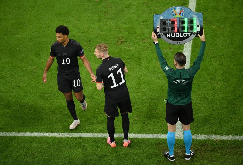 Serge Gnabry (left) comes off after 68 minutes of play to be replaced by Timo Werner (centre)