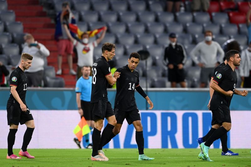 Germany players react after Leon Goretzka (centre, #18) scored the side&#039;s equalizer against Hungary