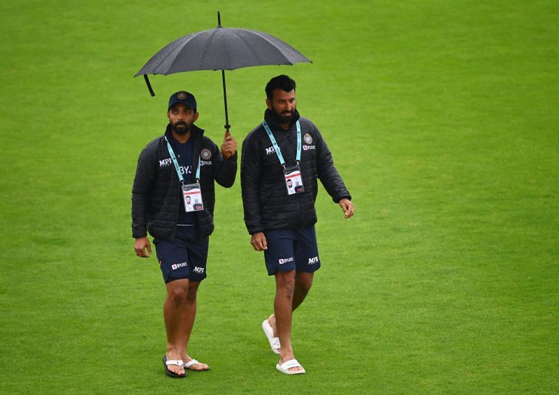 Ajinkya Rahane and Cheteshwar Pujara walk across the outfield in Southampton. Pic: Getty Images