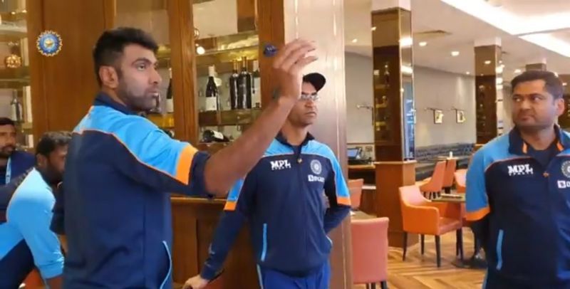 Team India cricketers engage in a game of dart