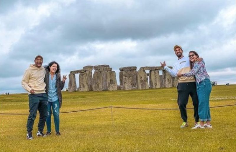 Mayank Agarwal and Ishant Sharma pose with their better halves in front of the famous prehistoric monument Stonehenge. Pic: Ishant Sharma/ Instagram