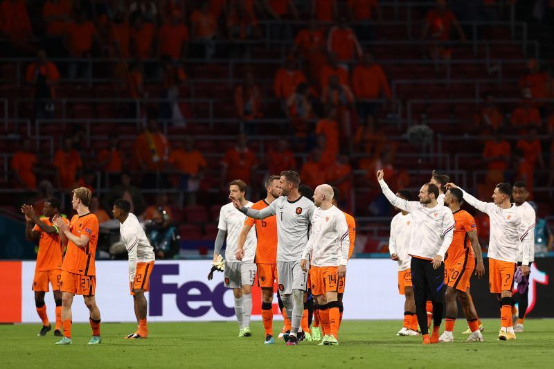 Netherlands celebrate with the fans in Amsterdam following the victory over Ukraine in the Euro 2020