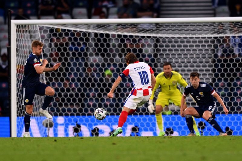Luka Modric scored and provided an assist as Croatia beat Scotland.
