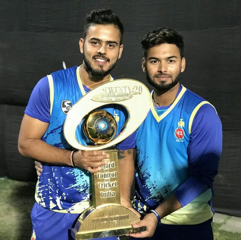Nitish Rana and Rishabh Pant with the Syed Mushtaq Ali Trophy