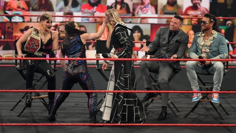 Left to right: Rhea Ripley, Nikki Cross, Charlotte Flair, The Miz, John Morrison