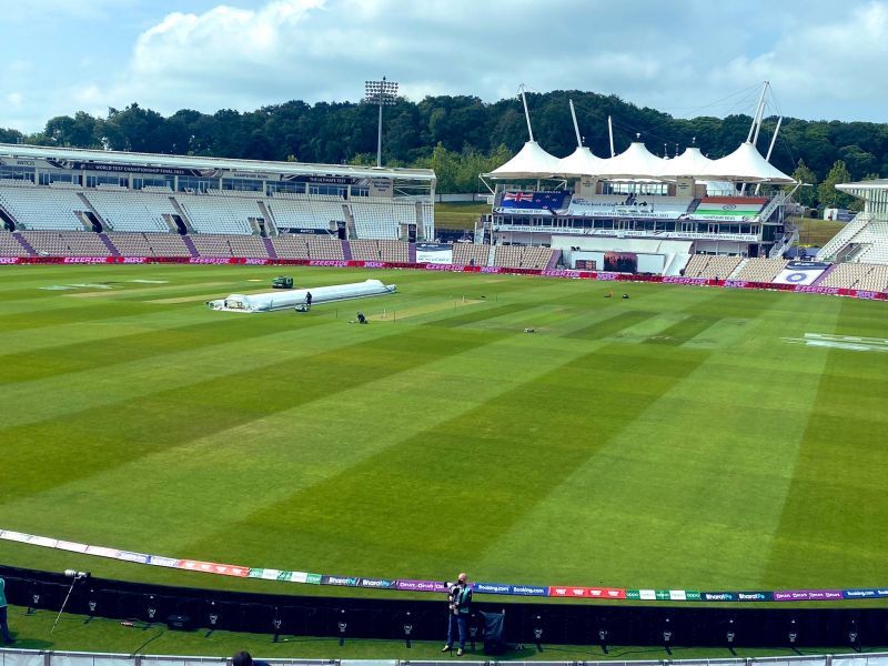 The playing surface for the India vs. New Zealand clash is visible in the background.