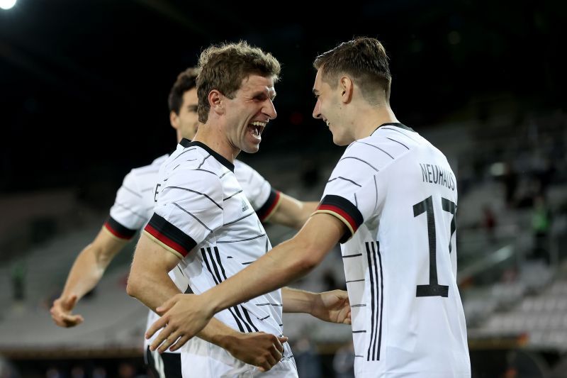 Florian Neuhaus (right) rejoices after scoring for Germany.