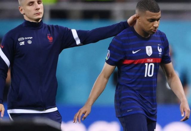 Kylian Mbappe is distraught after his missed penalty confirmed France&#039;s elimination at Euro 2020.