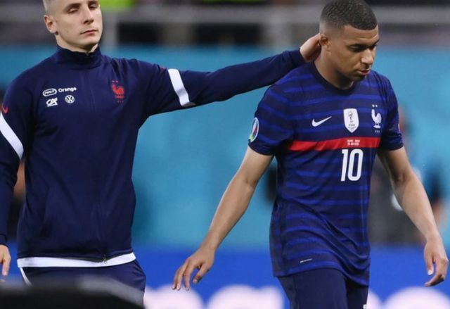 Kylian Mbappe is distraught after his missed penalty confirmed France's elimination at Euro 2020.