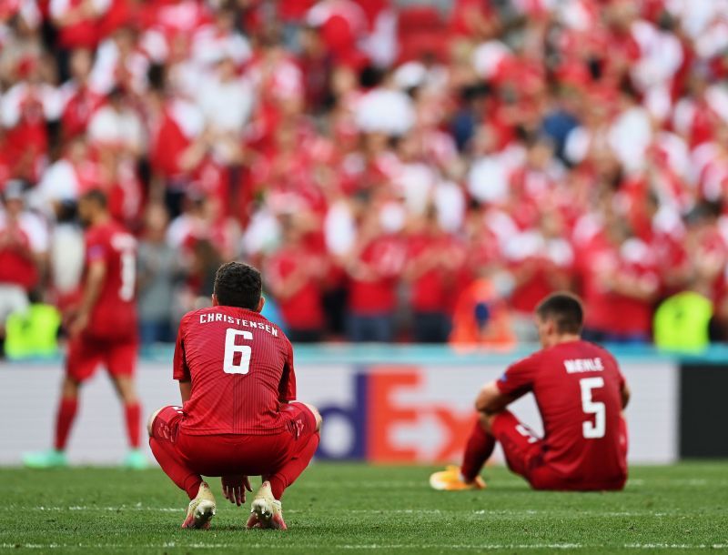 Defenders Andreas Christensen and Joakim Maehle look on in disappointment after Denmark's second Euro 2020 loss