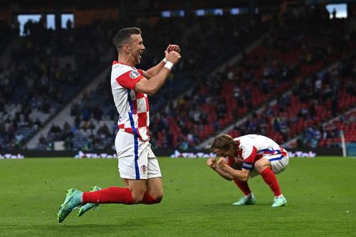 Ivan Perisic and Luka Modric celebrate after the former's goal for Croatia against Scotland