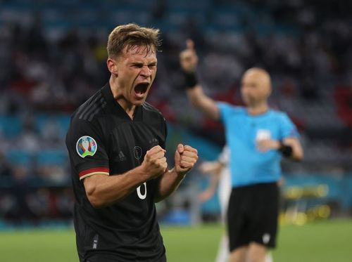 Joshua Kimmich celebrates Germany's second goal of the night against Hungary