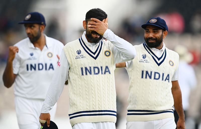 R Ashwin, Virat Kohli and Mohammed Shami (from left to right)