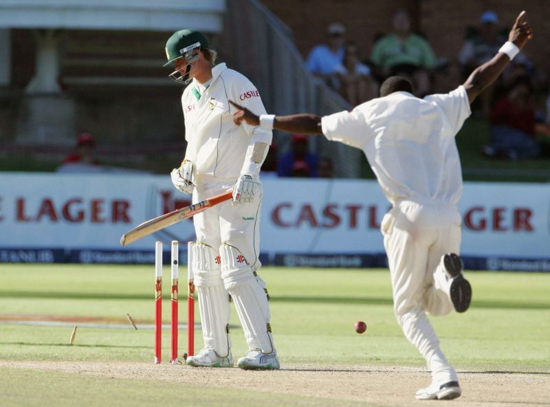 Champion strikes: Dwayne Bravo celebrates after picking a wicket against South Africa