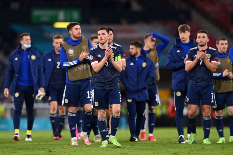 A dejected Scotland team acknowledge the crowd after their defeat to Croatia