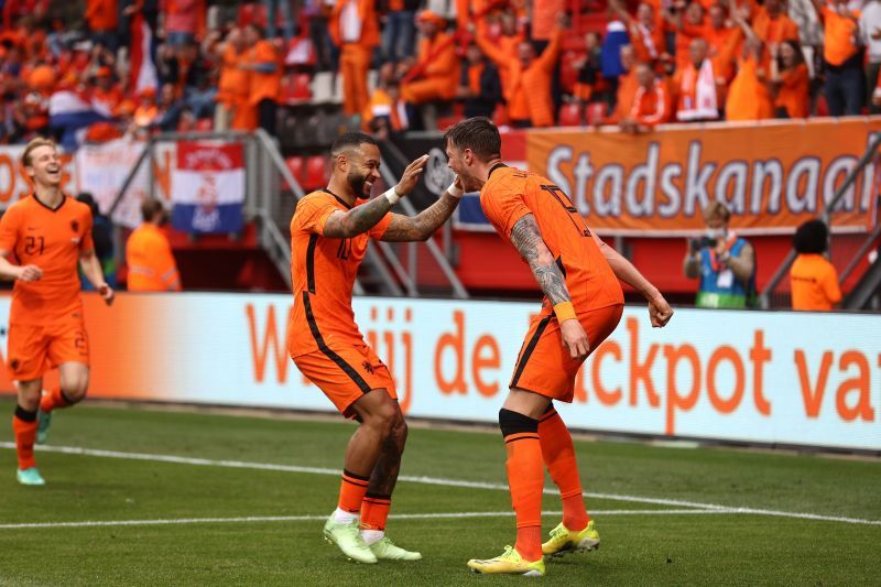 Depay celebrates after setting up Weghorst