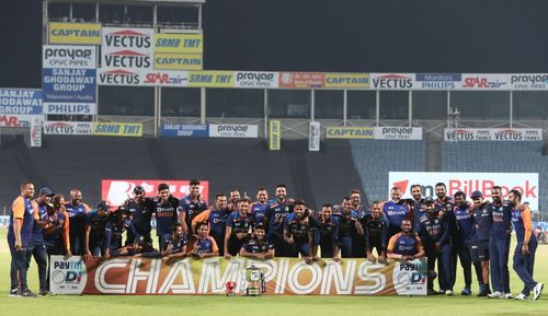 Indian players with the ODI trophy against England.