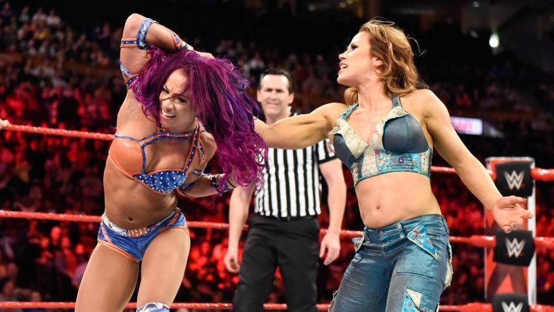 Mickie James and Sasha Banks in the ring