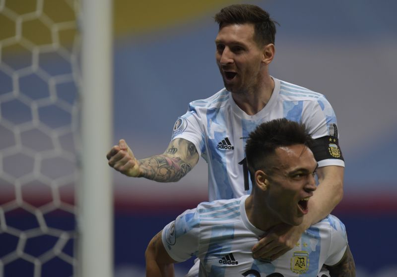 Lionel Messi exults after Lautaro Martinez scored against Columbia.