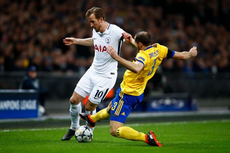 Harry Kane (left) in action against Giorgi Chiellini