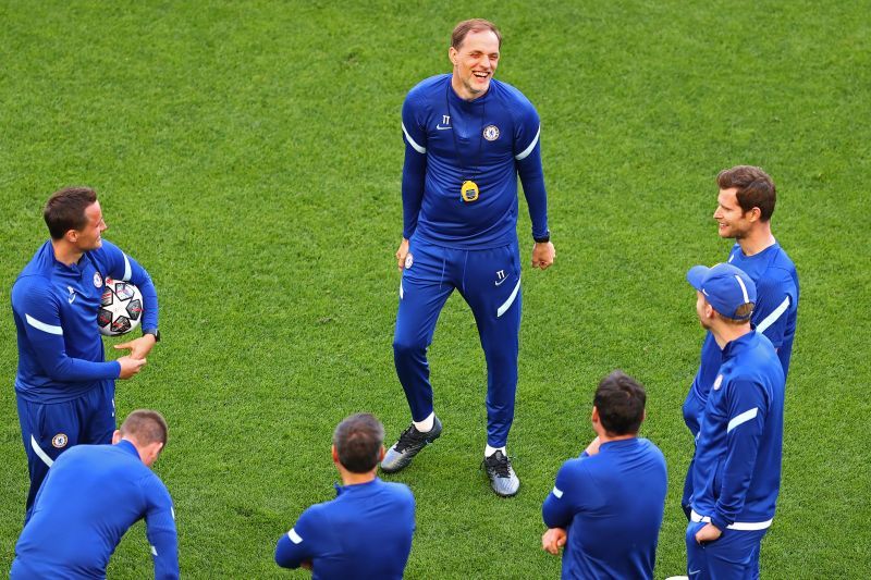 Chelsea manager Tomas Tuchel (centre) and his staff look on ahead of the 2021 Champions League Final