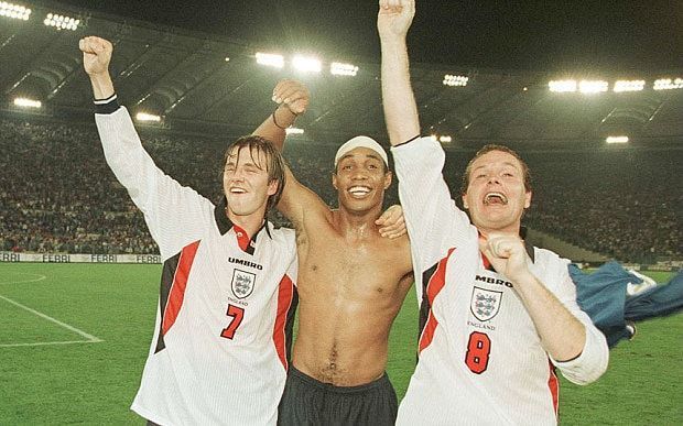 England players rejoice after qualifying for the World Cup after a goalless draw with Italy