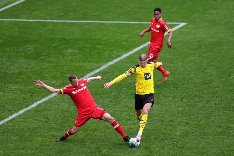 Erling Haaland (centre) vies for the ball during the 2020-21 Bundesliga season