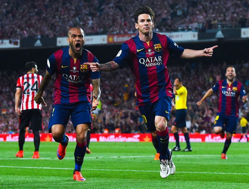 Messi and Alves celebrating the former&#039;s goal
