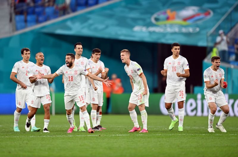 Spain celebrate coming through their penalty shoot-out with Switzerland